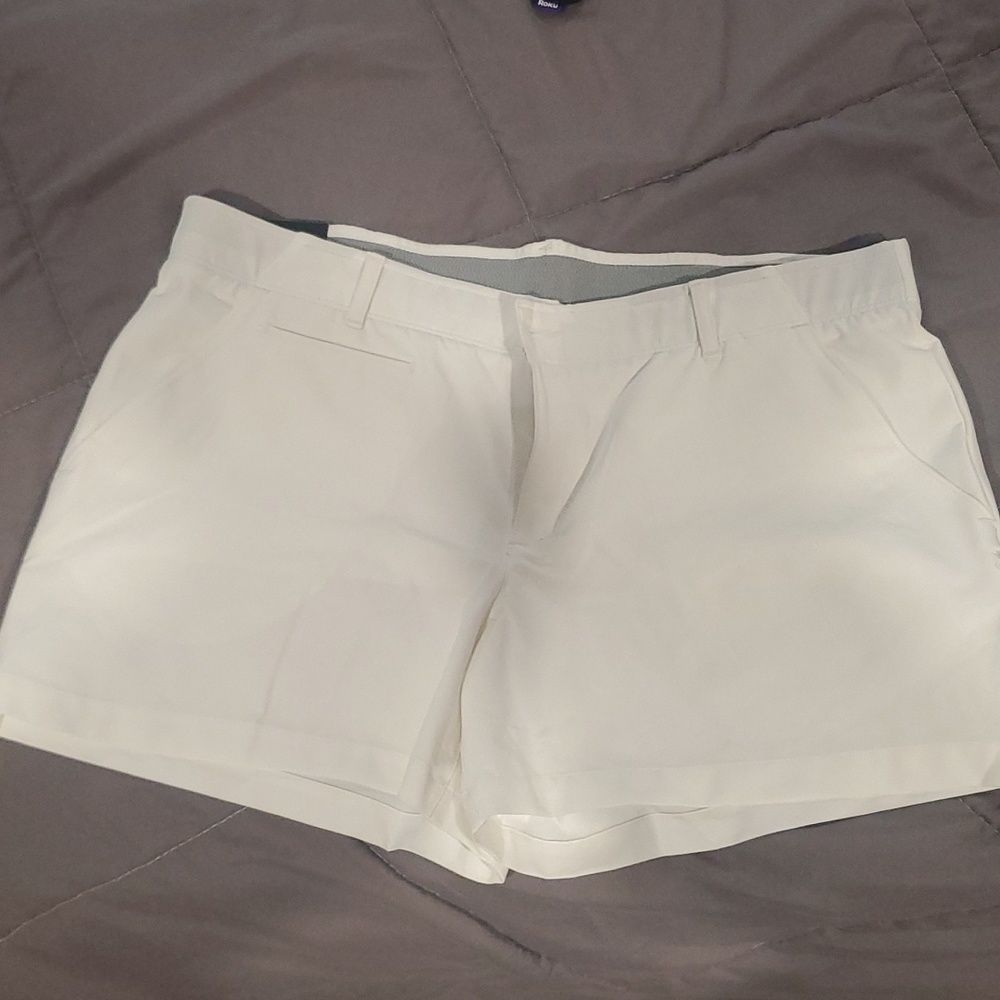 Woman's white under armour shorts. Never worn, tags on
